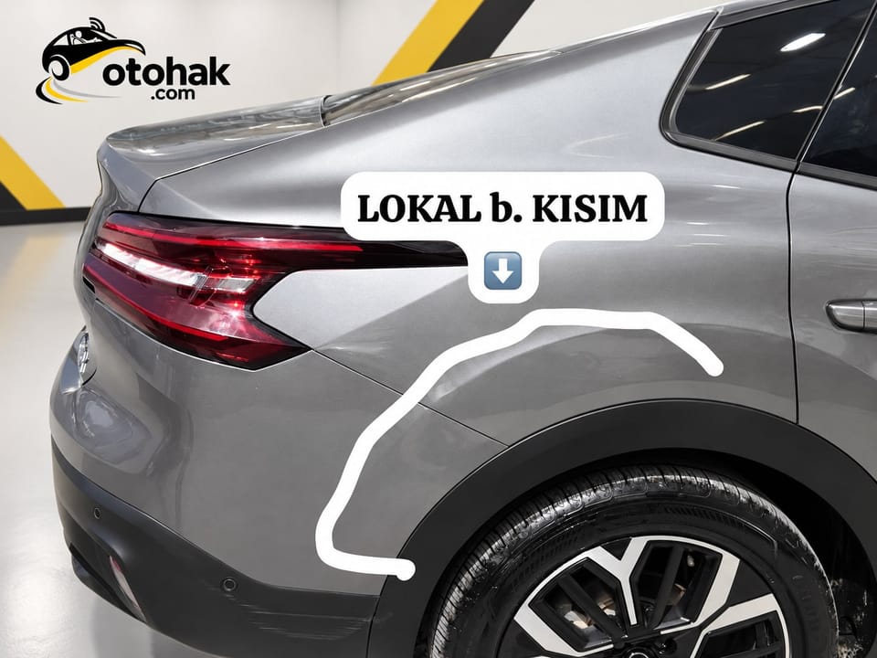 Gri Citroen e-C4 X'in sağ arka çamurluğunda işaretli lokal boya bölgesi